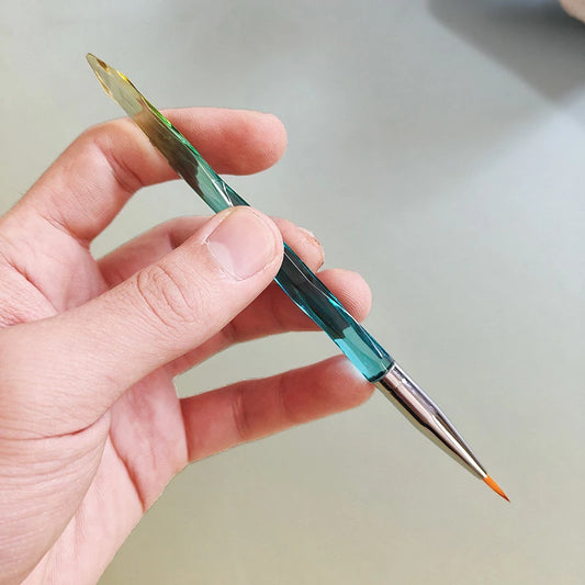 A gradient green paintbrush