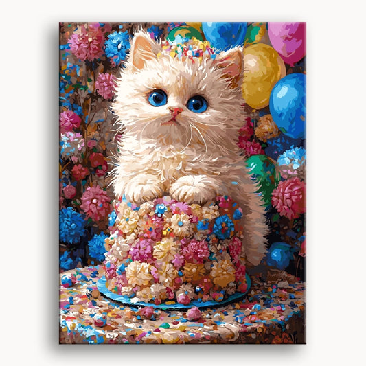 A playful white cat perched on a colorful cake surrounded by festive balloons.