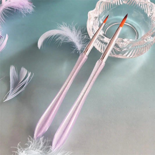 Two pink crystal paintbrushes